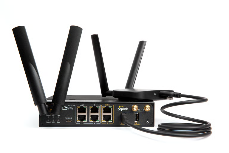 MBX Mini 5G router close-up showing compact form factor and port layout
